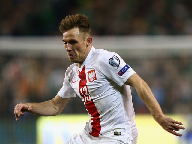 Maciej Rybus of Poland on the ball during the Euro 2016 qualifying football match between Republic of Ireland and Polandat Aviva Stadium on March 29, 2015