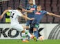 Napoli's player Gokhan Inler vies with VfL Wolfsburg player Ricardo Rodriguez during the UEFA Europa League quarter-final second leg match between SSC Napoli and VfL Wolfsburg on April 23, 2015