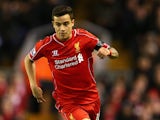 Philippe Coutinho runs with the ball for Liverpool during their Premier League meeting with Newcastle United on April 13, 2015
