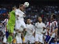 Real Madrid's goalkeeper Iker Casillas punches the ball during the UEFA Champions League quarter-finals second leg football match Real Madrid CF vs Club Atletico de Madrid at the Santiago Bernabeu stadium in Madrid on April 22, 2015