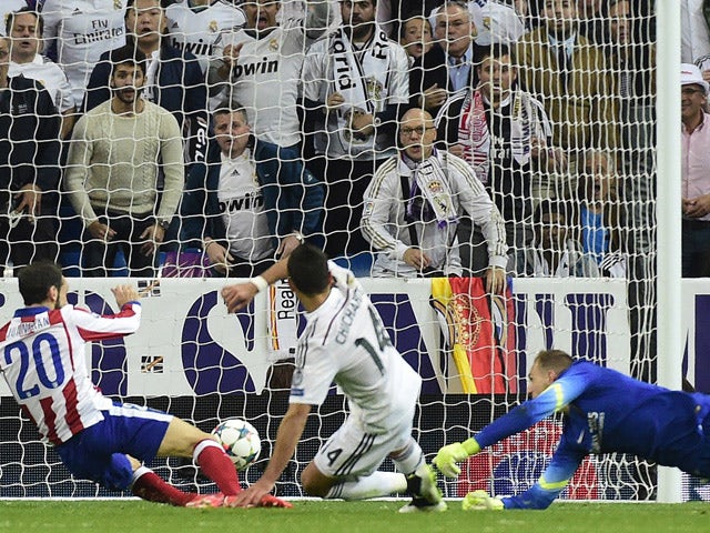 Real Madrid's Mexican forward Javier Hernandez shoots to score a goal during the UEFA Champions League quarter-finals second leg football match Real Madrid CF vs Club Atletico de Madrid at the Santiago Bernabeu stadium in Madrid on April 22, 2015