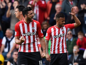 Graziano Pelle of Southampton celebrates scoring the opening goal with Ryan Bertrand of Southampton during the Barclays Premier League match between Southampton and Tottenham Hotspur at St Mary's Stadium on April 25, 2015