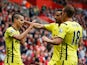 Erik Lamela of Spurs celebrates scoring their first goal with Nacer Chadli and Harry Kane of Spurs during the Barclays Premier League match between Southampton and Tottenham Hotspur at St Mary's Stadium on April 25, 2015