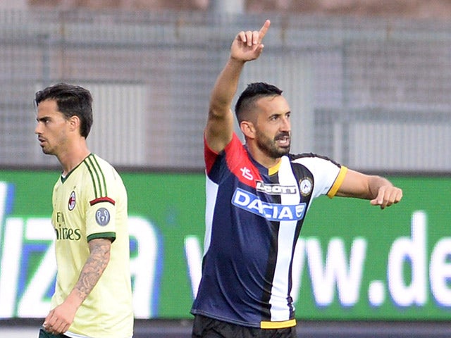 Giampiero Pinzi of Udinese Calcio celebrates after scoring his opening goal during the Serie A match between Udinese Calcio and AC Milan at Stadio Friuli on April 25, 2015