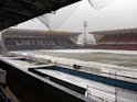 Snow covers Windsor Park pitch and stadium in Belfast, Northern Ireland, on March 22, 2013