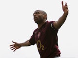 Thierry Henry of Arsenal celebrates scoring his teams third goal during the Barclays Premiership match between Arsenal and Wigan Athletic at Highbury on May 7, 2006