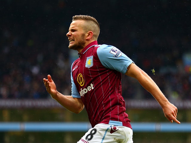 Tom Cleverley of Aston Villa celebrates his team's third goal during the Barclays Premier League match between Aston Villa and Everton at Villa Park on May 2, 2015