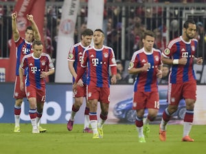 Lewandowski puts Bayern ahead against Dortmund