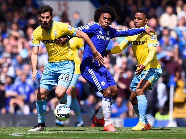 Willian of Chelsea battles with Joe Ledley and Jason Puncheon of Crystal Palace during the Barclays Premier League match between Chelsea and Crystal Palace at Stamford Bridge on May 3, 2015