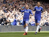 Chelsea's Belgian midfielder Eden Hazard celebrates with Chelsea's Serbian midfielder Nemanja Matic after scoring during the English Premier League football match between Chelsea and Crystal Palace at Stamford Bridge in London on May 3, 2015