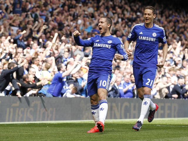 Chelsea's Belgian midfielder Eden Hazard celebrates with Chelsea's Serbian midfielder Nemanja Matic after scoring during the English Premier League football match between Chelsea and Crystal Palace at Stamford Bridge in London on May 3, 2015
