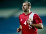 Danny Higginbotham of Gibraltar in action during the international friendly match between Gibraltar and Slovakia at Estadio do Alagarve on November 19, 2013