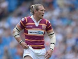 Eorl Crabtree of Huddersfield Giants in action during the Super League match between Huddersfield Giants and Bradford Bulls at Etihad Stadium on May 18, 2014