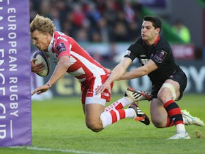 Billy Twelvetrees of Gloucester moves away from Sam Hidalgo-Clyne to score a try during the European Rugby Challenge Cup Final match between Edinburgh and Gloucester at Twickenham Stoop on May 1, 2015