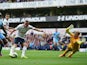 Harry Kane of Spurs is foiled by goalkeeper Joe Hart of Manchester City during the Barclays Premier League match between Tottenham Hotspur and Manchester City at White Hart Lane on May 3, 2015