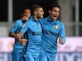 Mauro Icardi of Internazionale celebrates after scoring his team's opening goal from the penalty spot during the Serie A match between Udinese Calcio and FC Internazionale Milano at Stadio Friuli on April 28, 2015