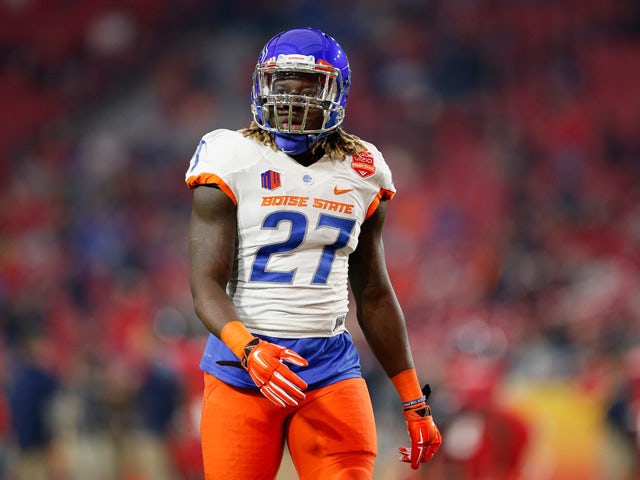 Running back Jay Ajayi #27 of the Boise State Broncos warms up before the Vizio Fiesta Bowl against the Arizona Wildcats at University of Phoenix Stadium on December 31, 2014