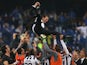 Juventus' players celebrate with their coach Massimiliano Allegri after winning the 'Scudetto' at the end of the Italian Serie A football match Sampdoria Vs Juventus on May 2, 2015