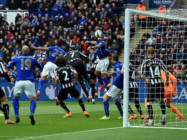 Leonardo Ulloa of Leicester City heads the opening goal during the Barclays Premier League match between Leicester City and Newcastle United at The King Power Stadium on May 2, 2015