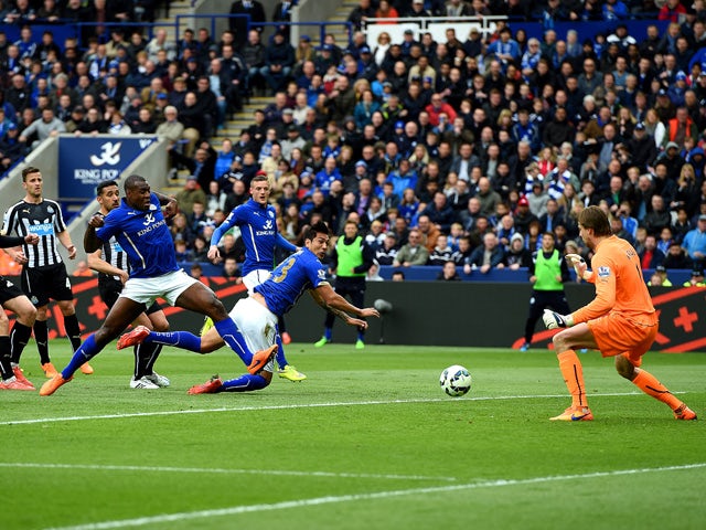 Wes Morgan of Leicester City scores his team's second goal during the Barclays Premier League match between Leicester City and Newcastle United at The King Power Stadium on May 2, 2015