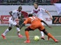 Bordeaux's Uruguyan forward Diego Rolan, Bordeaux's Czech midfielder Jaroslav Plasil and Lorient's Gabonese midielder Ndong Ibrahim Didier (C) play the ball during the French L1 football match between FC Lorient and FC Girondins de Bordeaux on May 2, 2015