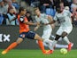 Montpellier's defender Daniel Congre (L) vies for the ball with Rennes's forward Paul Georges Ntep (R) during the French L1 football match between Montpellier and Rennes on May 2, 2015