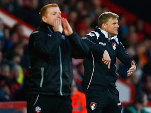 Bolton boss Neil Lennon and Bournemouth counterpart Eddie Howe on the touchline on April 27, 2015