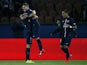 Paris Saint-Germain's Italian midfielder Marco Verratti celebrates with Dutch defender Gregory van der Wiel and Brazilian defender Maxwell after scoring a goal during the French L1 football match between Paris Saint-Germain (PSG) and Metz at the Parc des 