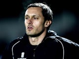 Grimsby manager Paul Hurst looks on ahead of the Skrill Conference Premier League match between Barnet and Grimsby Town at The Hive Stadium on February 18, 2014