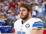 Tackle Riley Reiff #71 of the Detroit Lions on the bench during the NFL game against the Arizona Cardinals at the University of Phoenix Stadium on November 16, 2014
