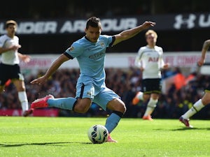 Sergio Aguero of Manchester City scores the opening goal during the Barclays Premier League match between Tottenham Hotspur and Manchester City at White Hart Lane on May 3, 2015