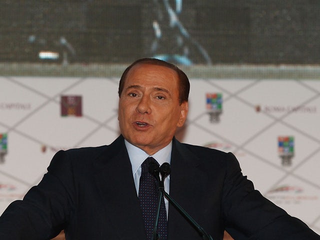 Italian Prime Minister Silvio Berlusconi attends the meeting to unveil the City of Rome's projects for the 2020 Olympic Games bid on February 23, 2011