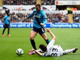 Phillip Bardsley of Stoke City and Federico Fernandez of Swansea City compete for the ball during the Barclays Premier League match between Swansea City and Stoke City at Liberty Stadium on May 2, 2015
