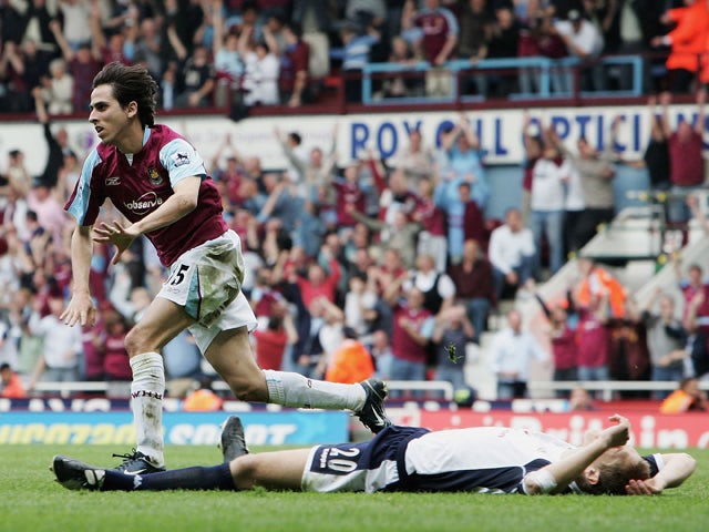 Yossi Benayoun of West Ham United celebrates scoring their second goal as Michael Dawson of Tottenham Hotspur lays on the pitch during the Barclays Premiership match between West Ham United and Tottenham Hotspur at Upton Park on May 7, 2006
