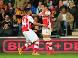 Alexis Sanchez of Arsenal (R) celebrates with Francis Coquelin as he scores their first goal during the Barclays Premier League match between Hull City and Arsenal at KC Stadium on May 4, 2015