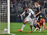 Juventus' forward from Spain Alvaro Morata scores during the UEFA Champions League semi-final first leg football match Juventus vs Real Madrid on May 5, 2015