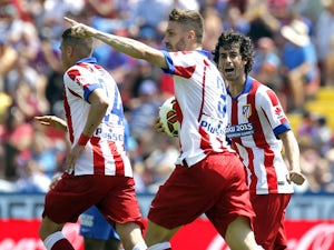Torres rescues draw for Atletico