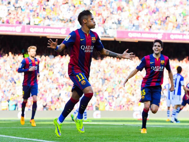 Neymar of FC Barcelona celebrates after scoring the opening goal during the La Liga match between FC Barcelona and Real Sociedad de Futbol at Camp Nou on May 9, 2015