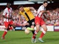 Barry Corr of Southend United battles with Dean Wells of Stevenage during the Sky Bet League 2 Playoff Semi-Final between Stevenage and Southend United at The Lamex Stadium on May 10, 2015
