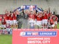 Bristol City players celebrate their League One championship win on May 4, 2015