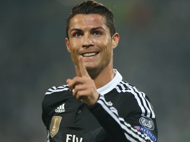 Real Madrid's Portuguese forward Cristiano Ronaldo celebrates after scoring during the UEFA Champions League semi-final first leg football match Juventus vs Real Madrid on May 5, 2015