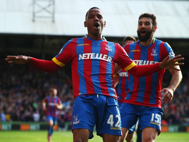 Jason Puncheon of Crystal Palace celebrates his team's first goal with Mile Jedinak during the Barclays Premier League match between Crystal Palace and Manchester United at Selhurst Park on May 9, 2015