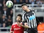 Newcastle United's French striker Emmanuel Riviere (R) challenges West Bromwich Albion's Argentinian midfielder Claudio Yacob (L) during the English Premier League football match between Newcastle United and West Bromwich Albion at St James Park, Newcastl