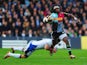 Marland Yarde of Harlequins is tackled by Matt Banahan of Bath Rugby during the Aviva Premiership match between Harlequins and Bath Rugby at Twickenham Stoop on May 8, 2015