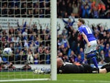 Paul Anderson of Ipswich scores past John Ruddy of Norwich during the Sky Bet Championship Playoff semi-final first leg match between Ipswich Town and Norwich Cityat Portman Road on May 9, 2015