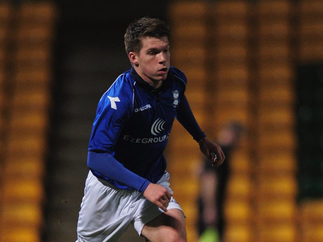 Birmingham City's James Fry carries the ball forward during an FA Youth Cup match against Norwich City on February 26, 2013