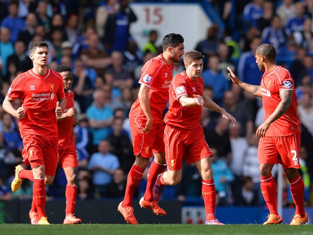 Liverpool captain Steven Gerrard celebrates with teammates after equalising for his side against Chelsea at Stamford Bridge on May 10, 2015