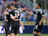 Lorient's players celebrate after scoring against Metz during the French L1 football match between Metz and Lorient at Saint Symphorien stadium in Longeville-Les-Metz, eastern France, on May 9, 2015