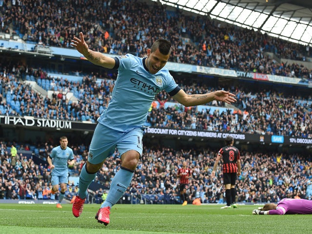 Manchester City's Argentinian striker Sergio Aguero celebrates his goal during the English Premier League football match between Manchester City and Queens Park Rangers at the Etihad Stadium in Manchester, northwest England, on May 10, 2015