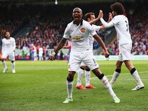 Ashley Young of Manchester United celebrates the goal scored by Marouane Fellaini during the Barclays Premier League match between Crystal Palace and Manchester United at Selhurst Park on May 9, 2015